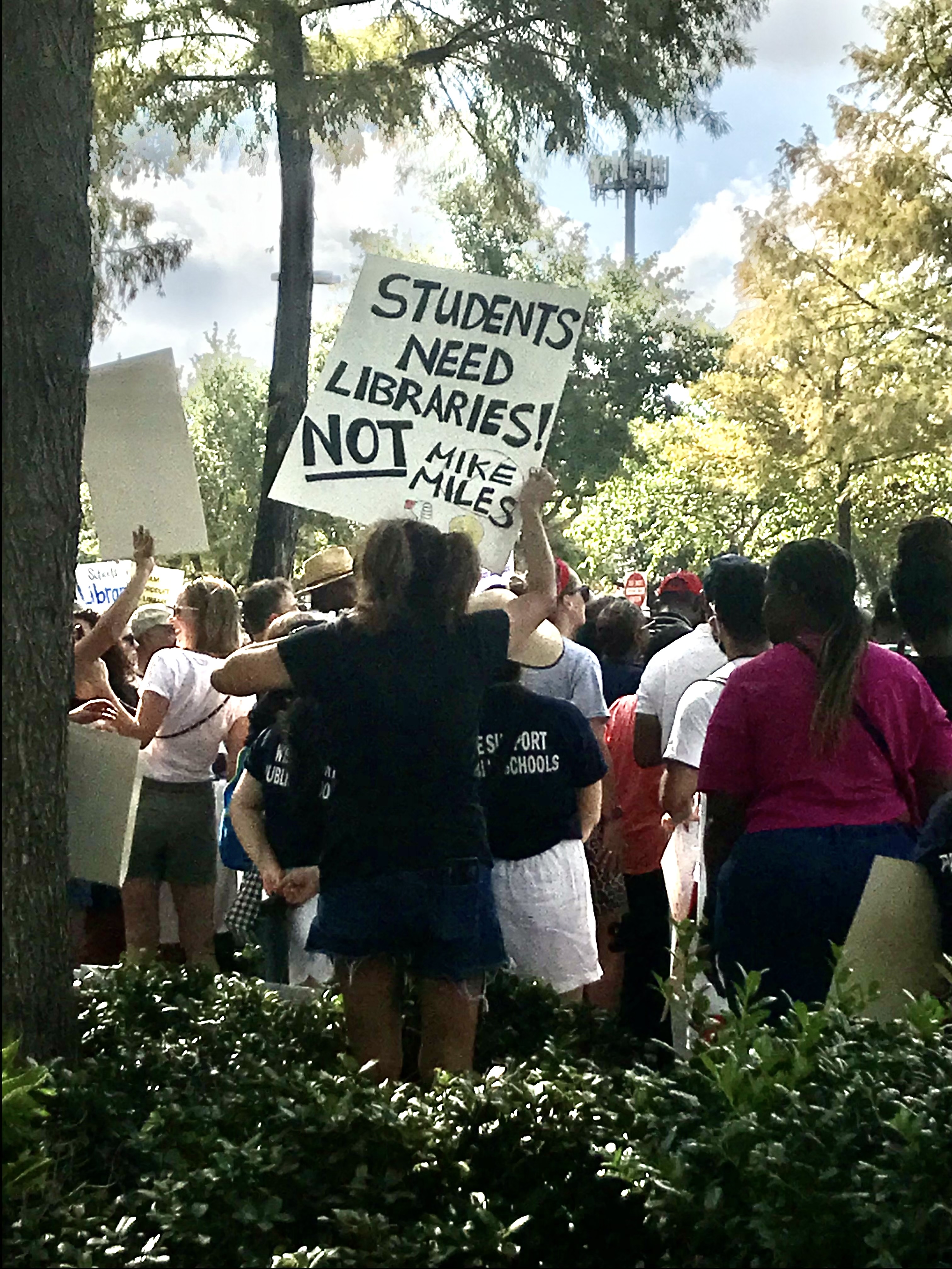 Demonstrators gather in August 2023 in protest of Houston ISD's plan to close libraries in schools. Photo by Nadia Tamez-Robledo for EdSurge.