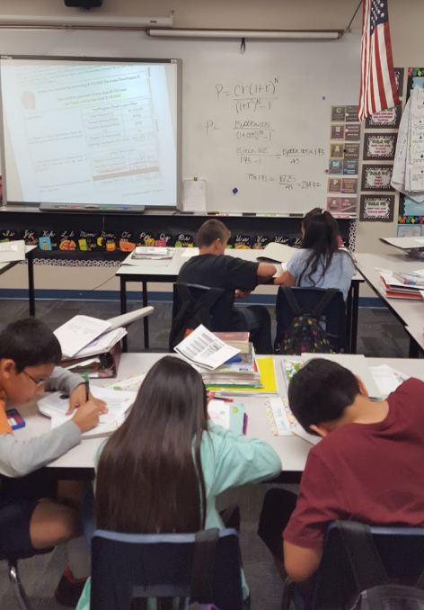 The traditional model of rows of classrooms facing front. (Jamie Schnepp)