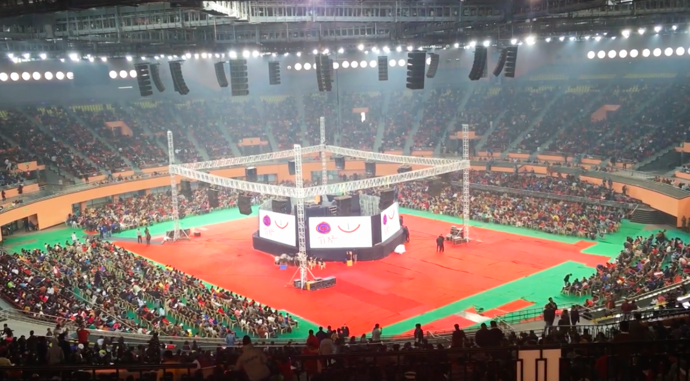 In this still from a Byju's provided video, about 20,000 students pack the country's largest indoor arena for a math lesson from the company's CEO in 2013.