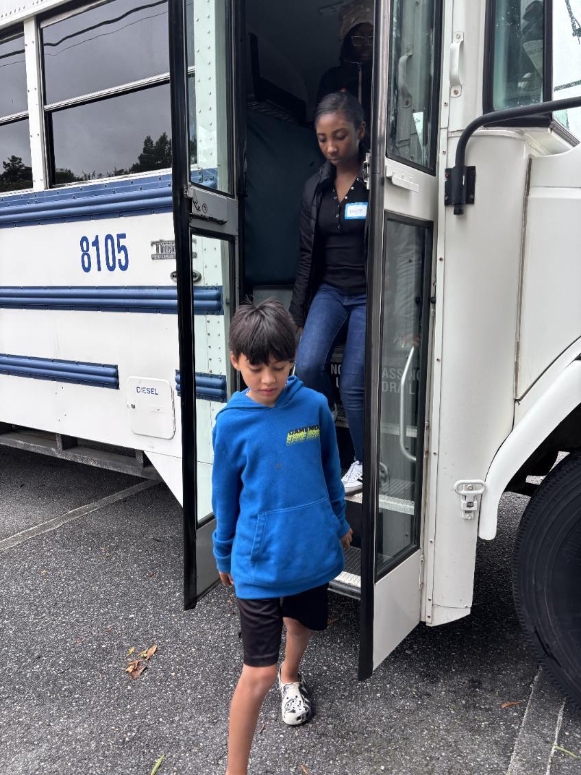 Students stepping off a bus for the microschool. Photo provided by Colina Bartlett, microschool administrator for Elizabeth City-Pasquotank Public Schools.