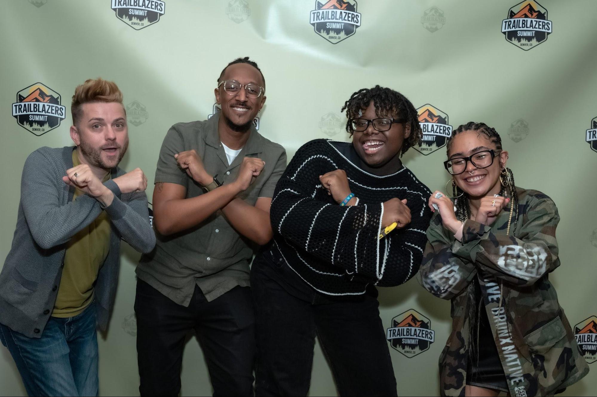 Left to Right: Ed.Extraordinary Manager for Youth Innovation Andy Lott and Big Picture Learning Director of Youth Voice Joshua Poyer give a playful pose with student panelists LaToya Beecham and Ly Iris at the Trailblazers Summit in June