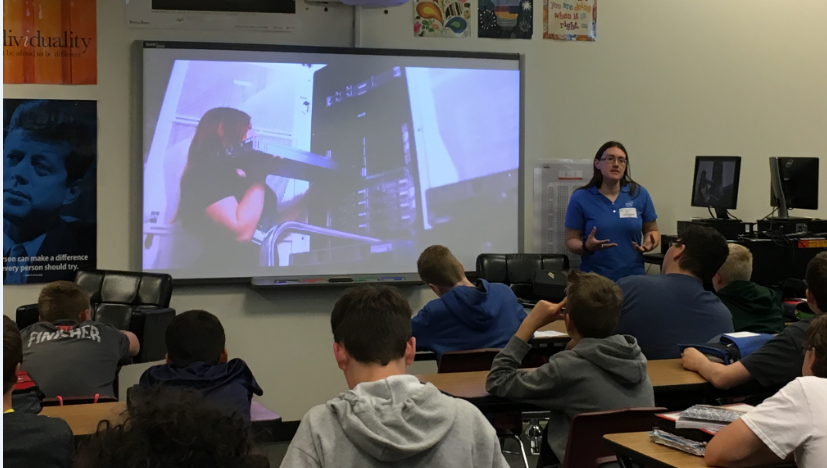 A career speaker from Intel talks with students about how microprocessors are made.