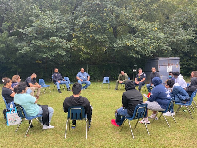 An outdoor family meeting at MAPs after the return to school.
