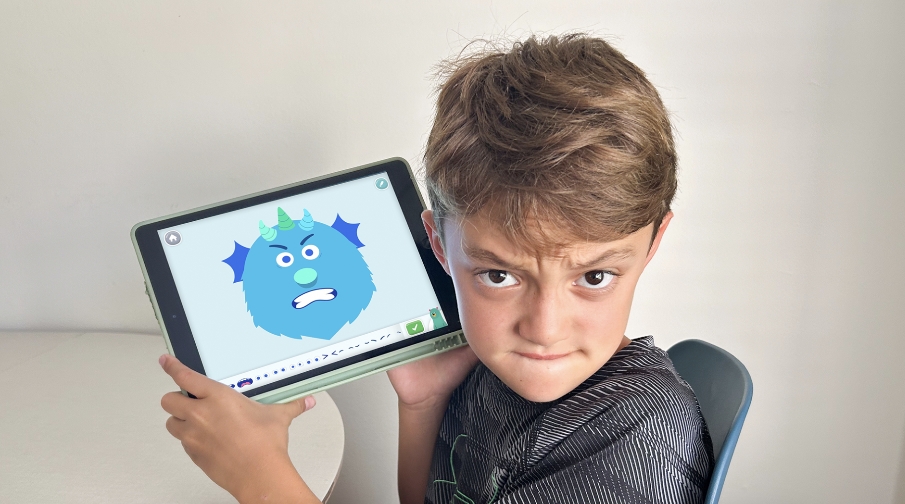 Owen practices identifying emotions.