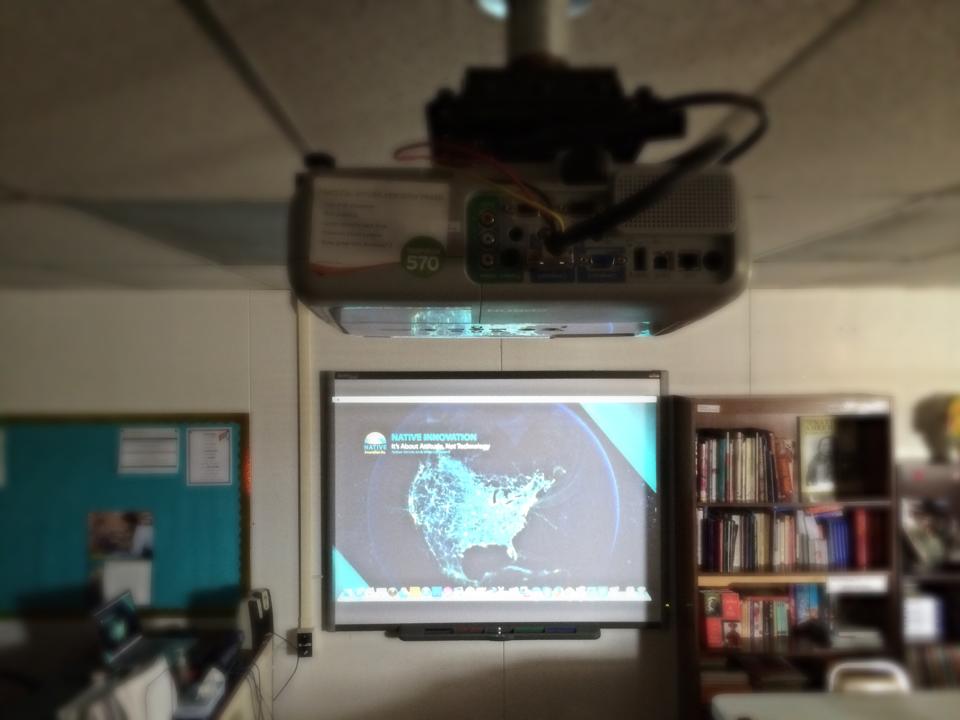 Setting up a SMARTboard at To'Hajiilee Community School. (Native Innovation)