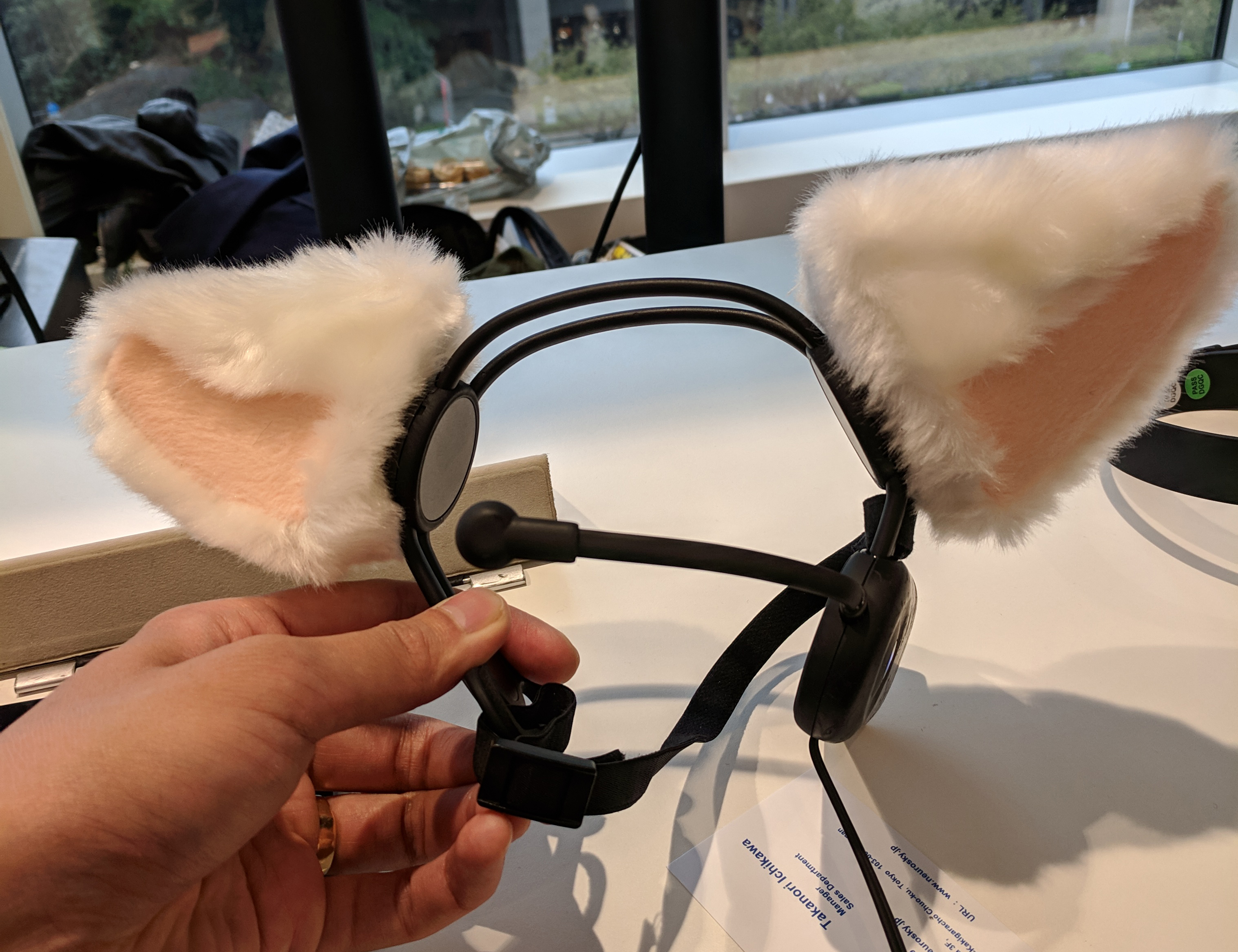 Cat ear headsets by Neurosky aim to track student brainwave data, but lack privacy policies for sensitive student data. (Photo Credit: Tony Wan)