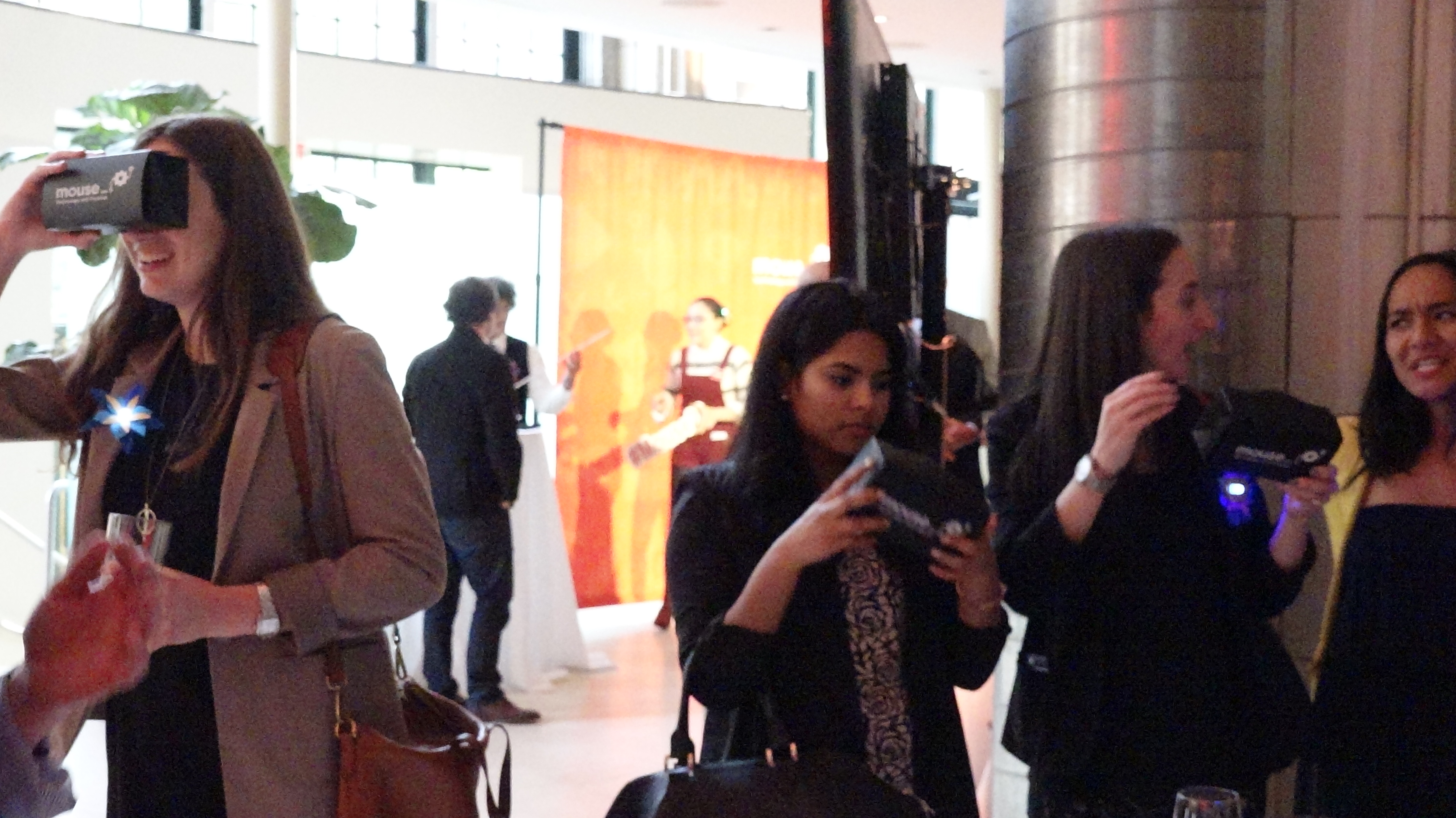 Audience members viewing Mouse student's VR projects