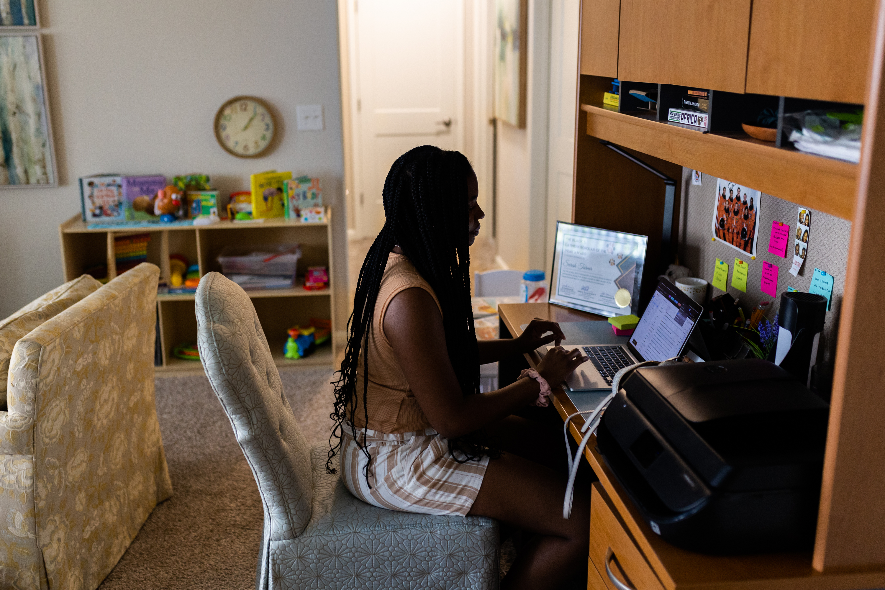 Sarah works at desk