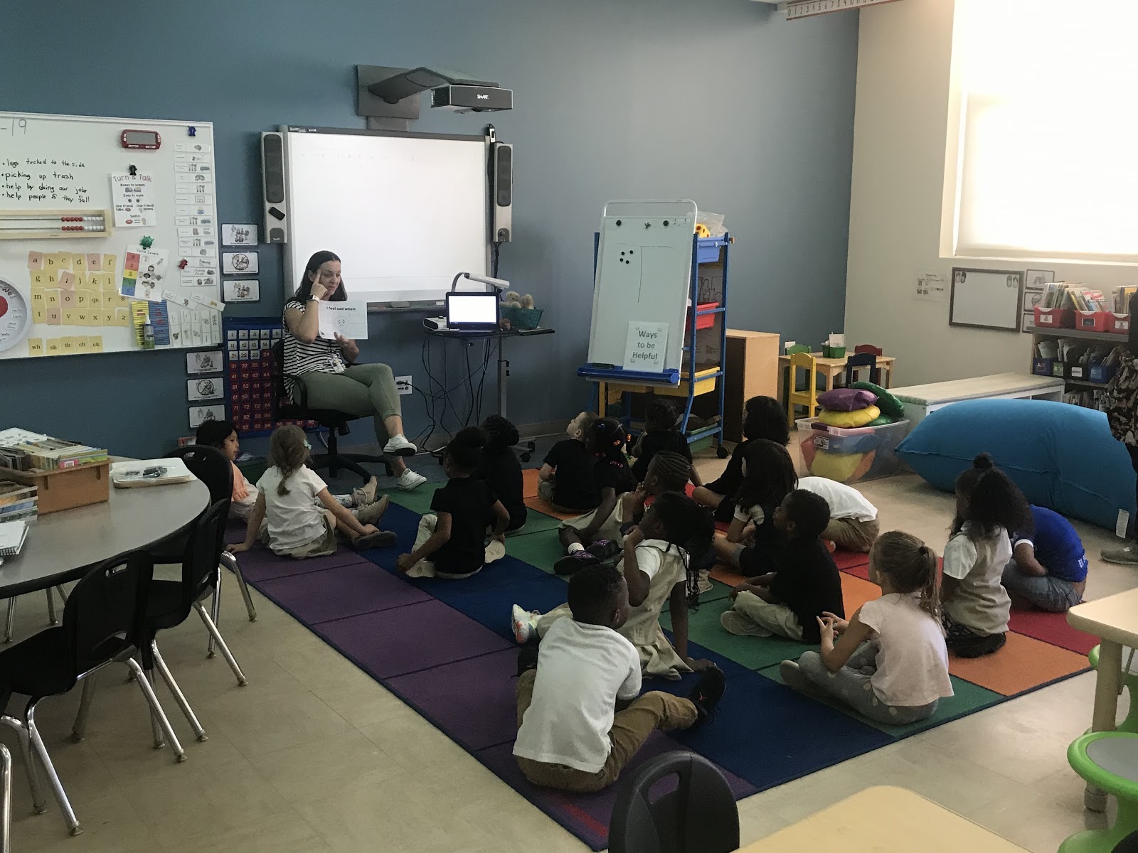 Kindergarten teacher Heather Murphy leading a Conscious Discipline morning ritual at Langley. (Emily Tate / EdSurge)