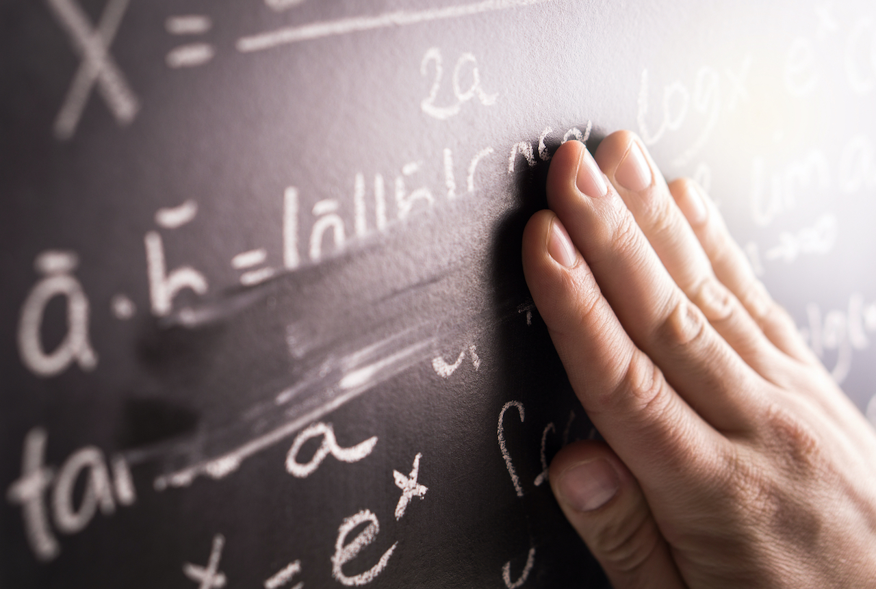 hand erasing chalkboard