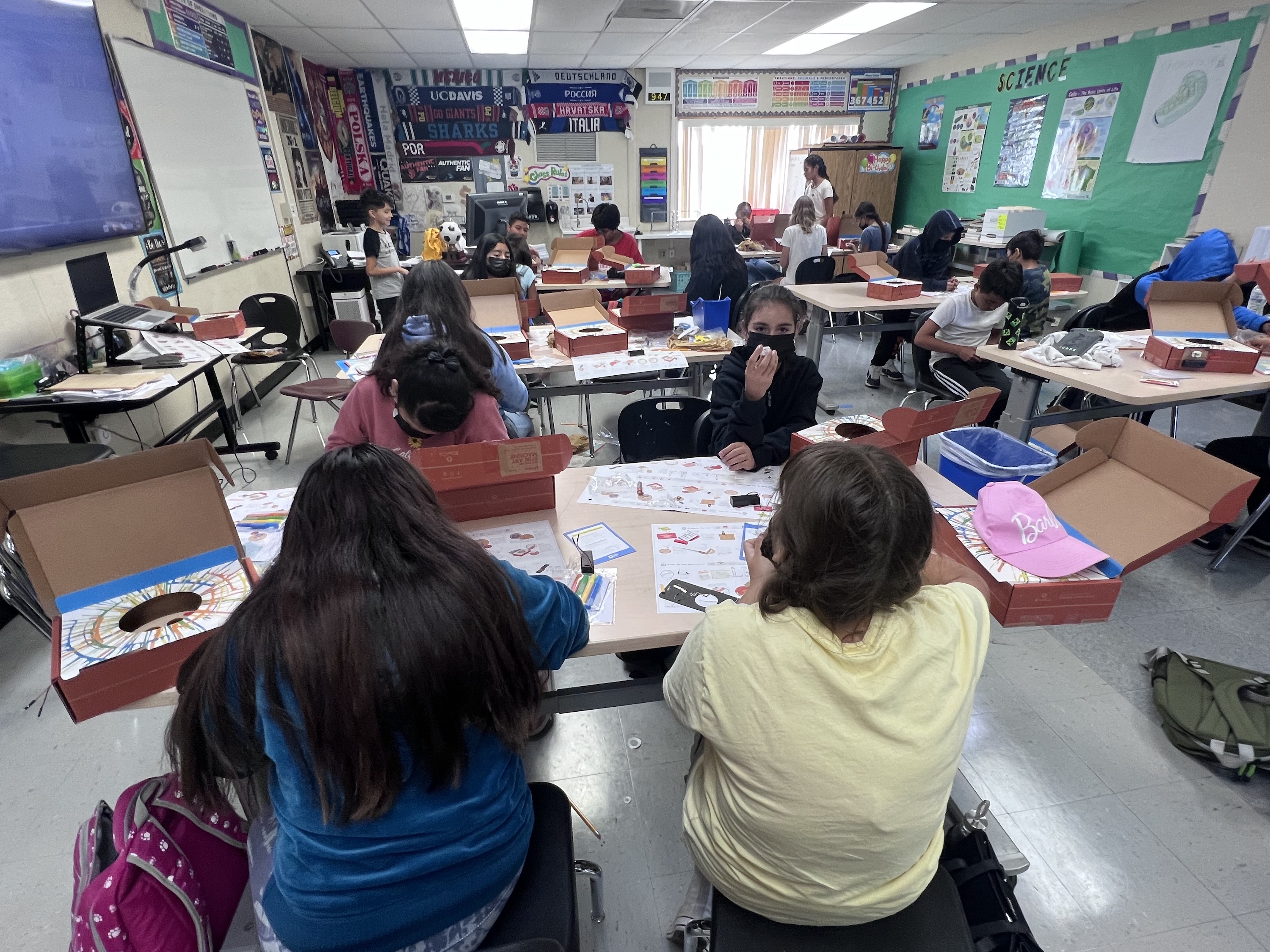Students must first follow directions to build their Spin Art machines. (image credit: Salvador Sainz)