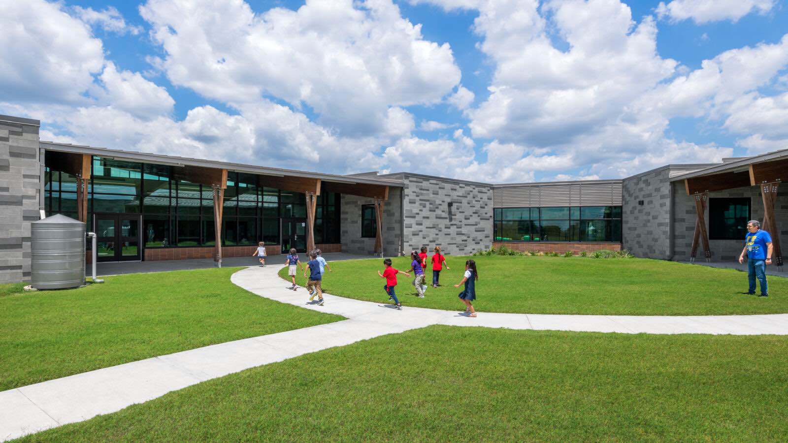 Windows at the Jefferson Early Learning Center are shielded from direct sunlight by overhangs. Wood was selected as the material for support beams to reduce the amount of heat absorbed by the school building. Photo courtesy of PBK.