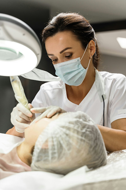 Doctor Performing Skin Procedure