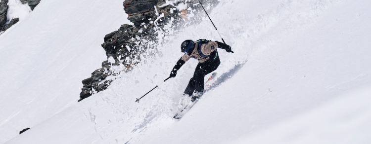 People walking away into ski mountains