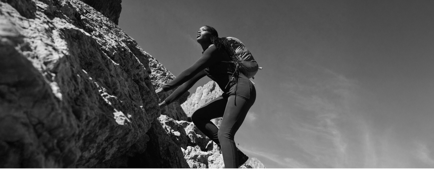 People walking away into ski mountains