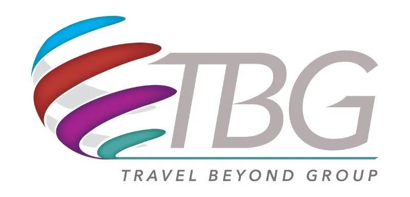 Logo for Travel Beyond Group (TBG) featuring stylized, colorful swooshes to the left of the large gray letters "TBG" with the words "TRAVEL BEYOND GROUP" written below in smaller text.