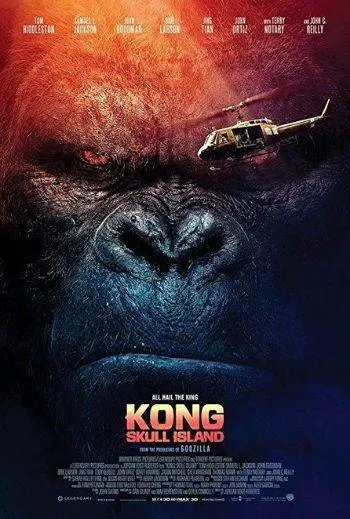 A movie poster for "Kong: Skull Island" shows a close-up of King Kong's face with a helicopter flying near his eye. The sky glows orange, and the film's title and credits are at the bottom.