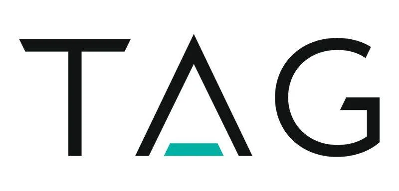 The word "TAG" in black capital letters, with the letter "A" stylized as an open triangle and a teal horizontal line near its base.