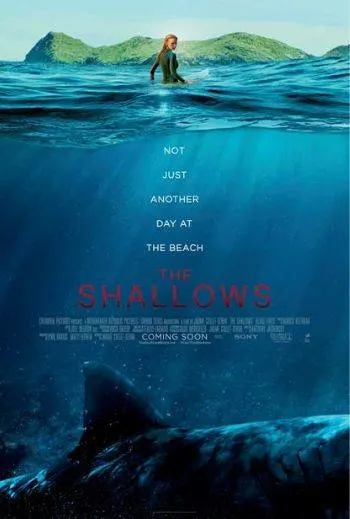 A woman stands in the ocean with mountains in the background. Large shark fin is visible underwater. Text reads: "Not just another day at the beach. The Shallows." Movie credits appear below.