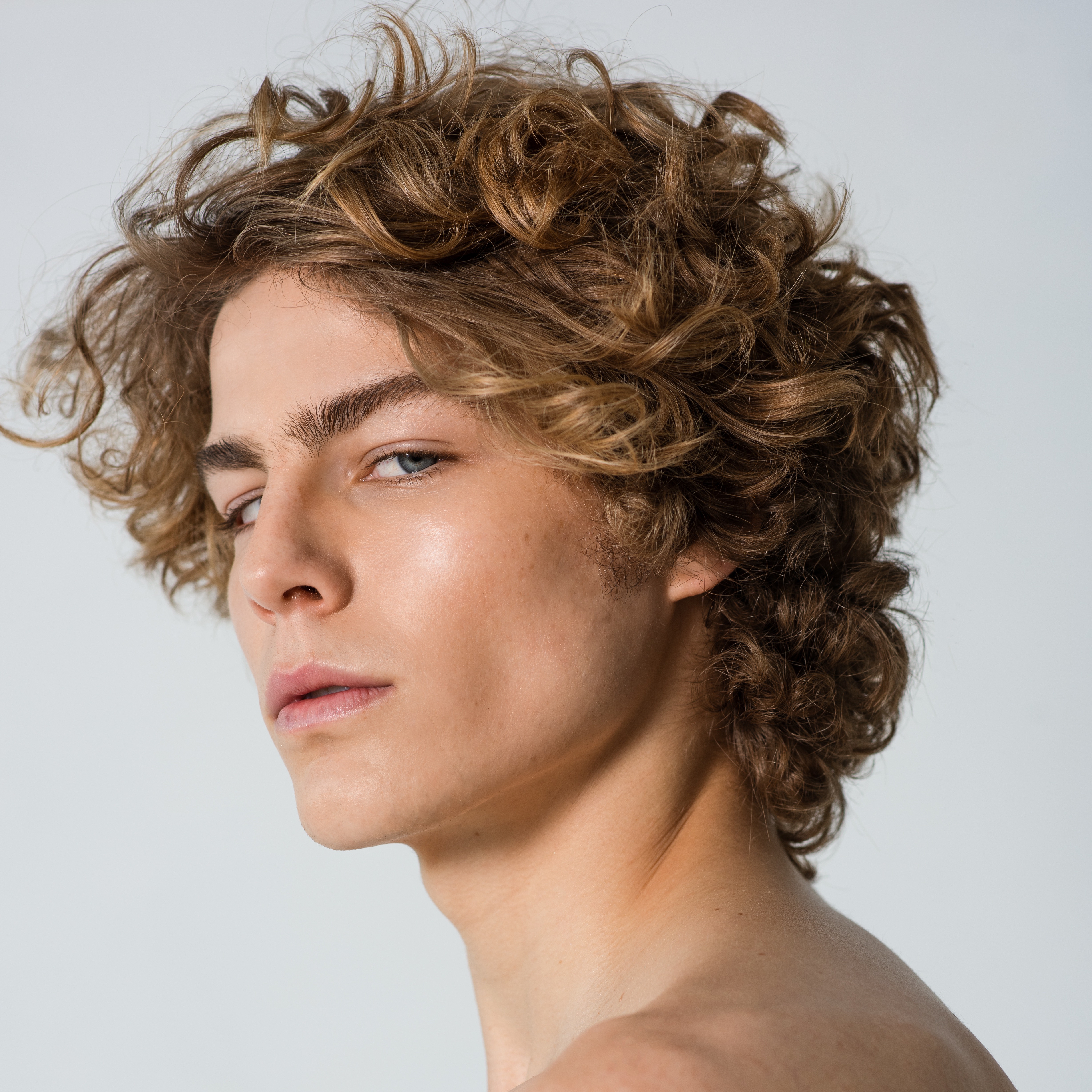 decorative hero image: man looking at camera