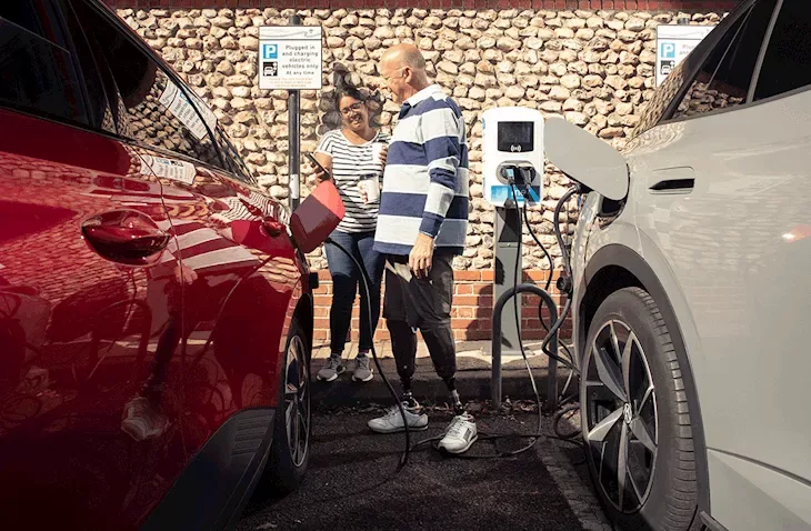 A family charging electric car