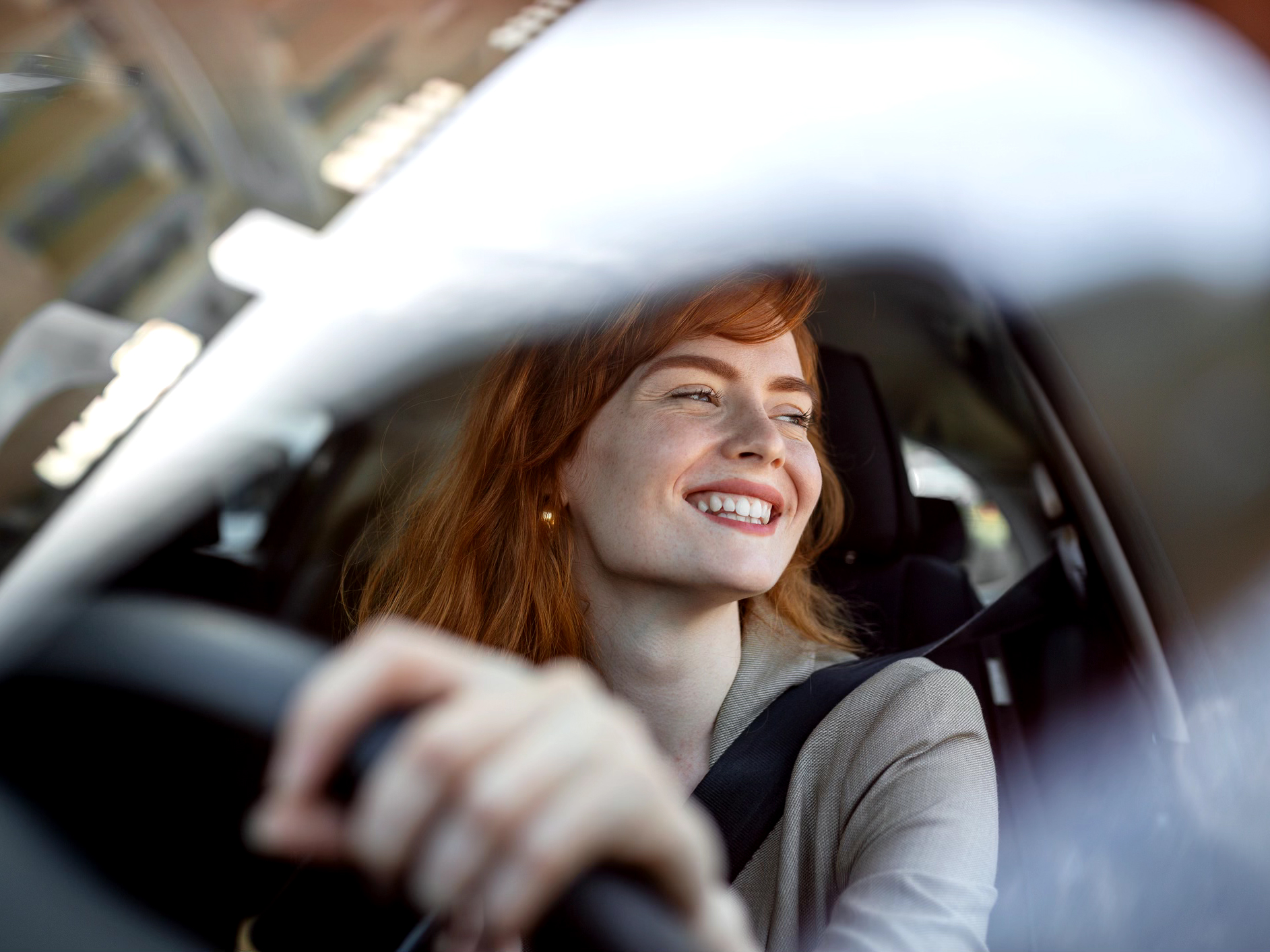 A person driving a car