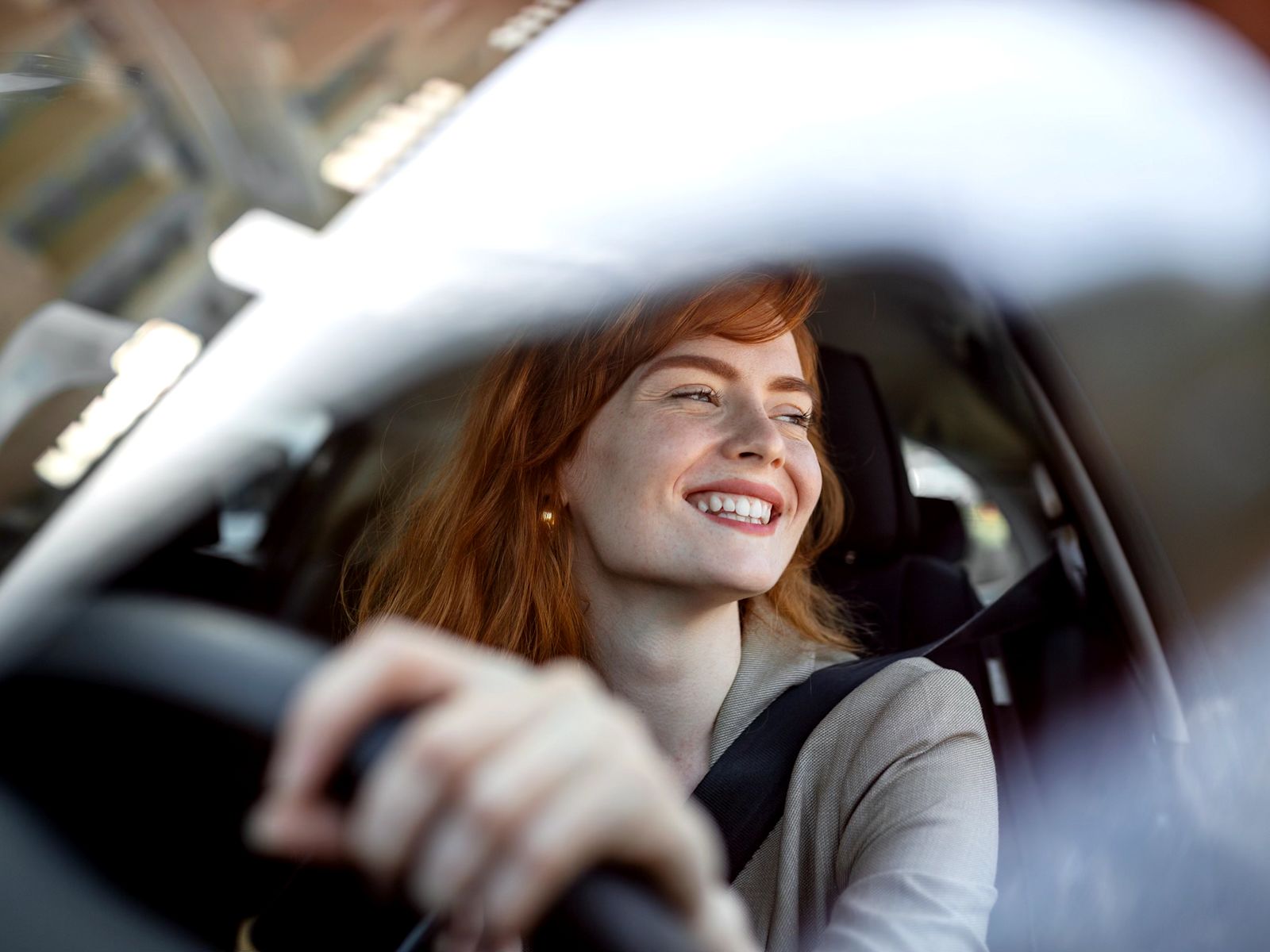 A person driving a car