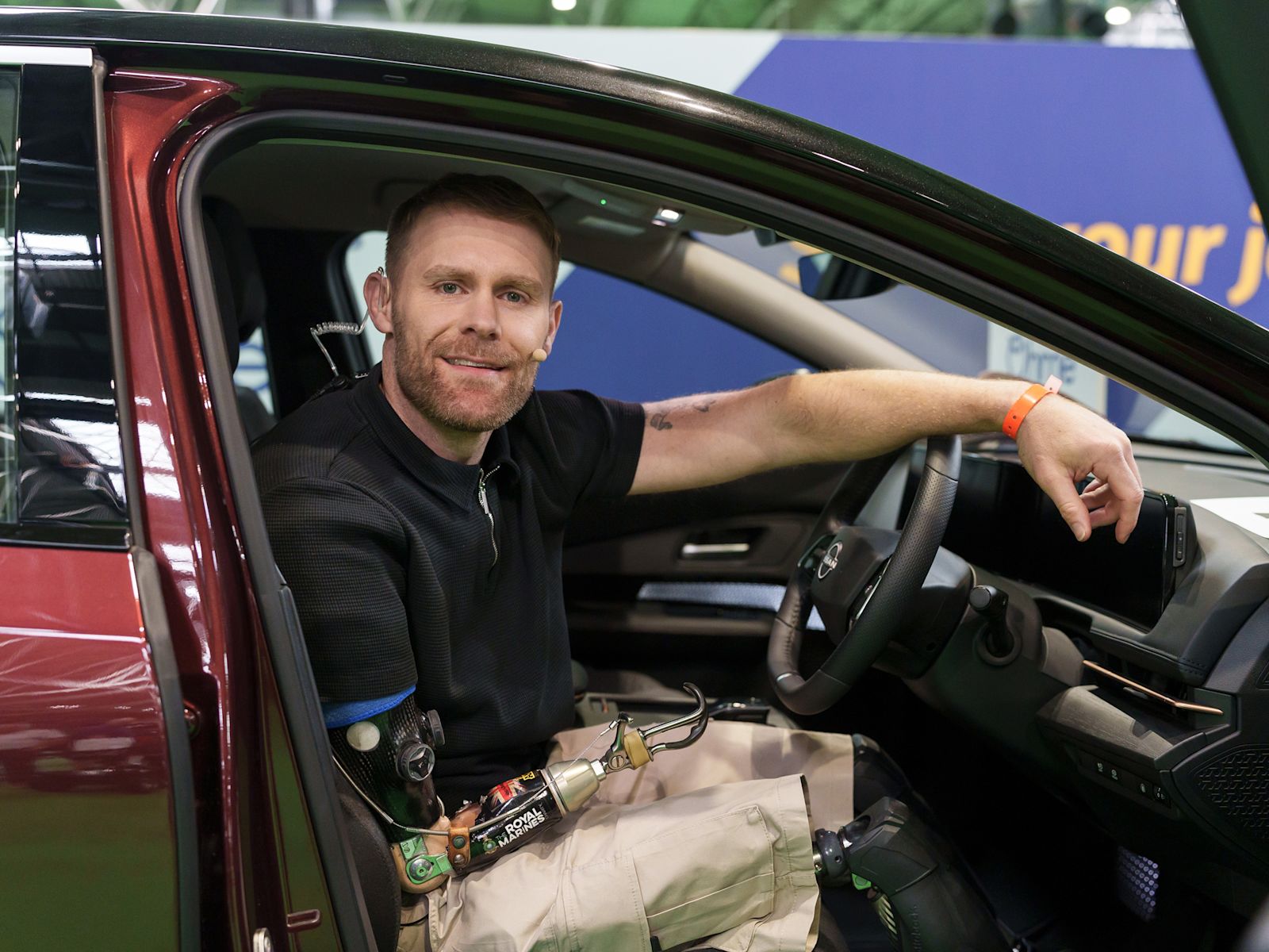 Scheme ambassador Mark Omrod in the drivers seat of a car