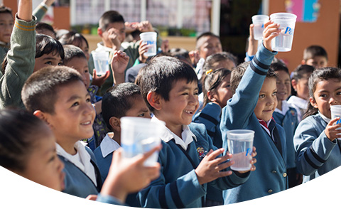 CSDW-Partners-children-celebrating-clean-water-cups-SP-UR