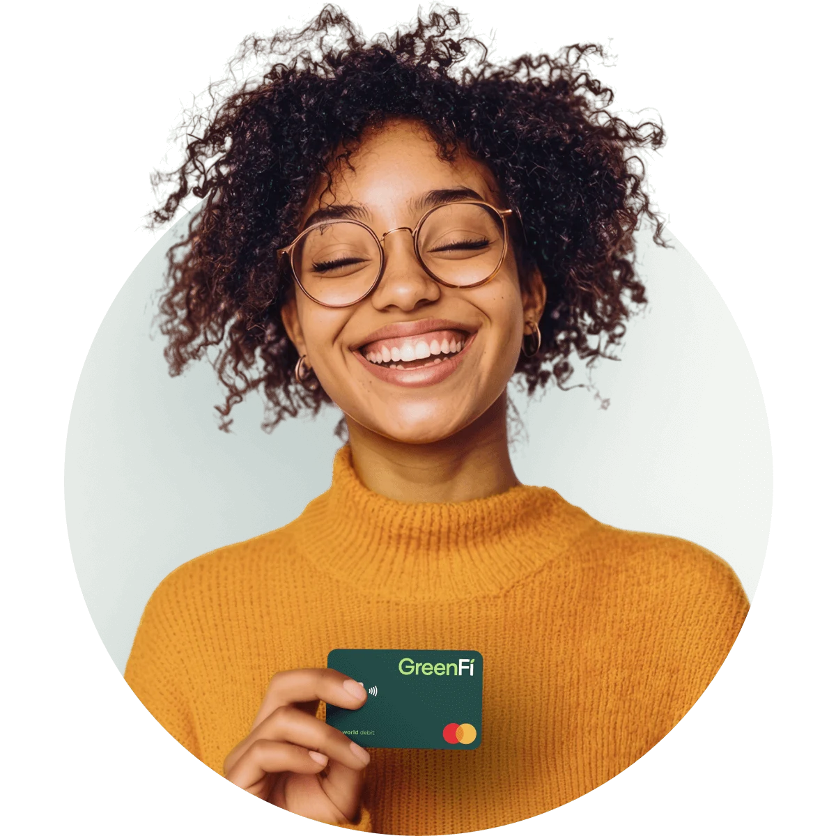 Woman holding GreenFi Card Cropped in Circle