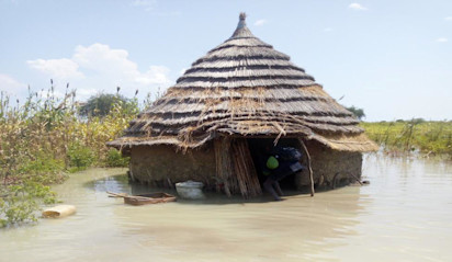A home in the Abyei Area surrounded by floodwaters