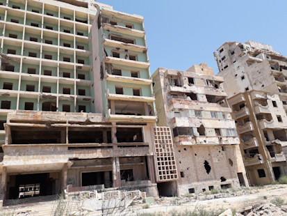Damaged housing in the Al Sabri neighborhood, Benghazi (UNHCR)