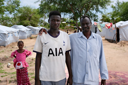 Originally from Nyala, Mahamat Ahmat Hassan Abdulahman (right) now lives on the Korsi asylum site in Birao. He had to flee with his five children and his wife, after losing all his possessions, including his business, which burned down during the violence in Sudan. UNHCR/Josselin Brémaud, Vakaga Prefecture, Central African Republic.