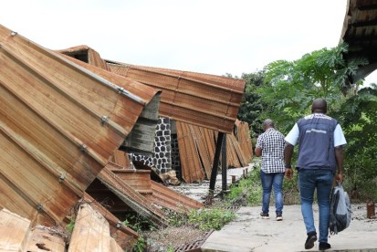 Humanitarian partners visiting the Mamfe district hospital which was burnt down by NSAGs in 2022 and has not been rebuilt.