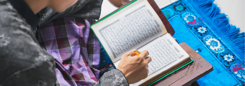 Person reading Quran