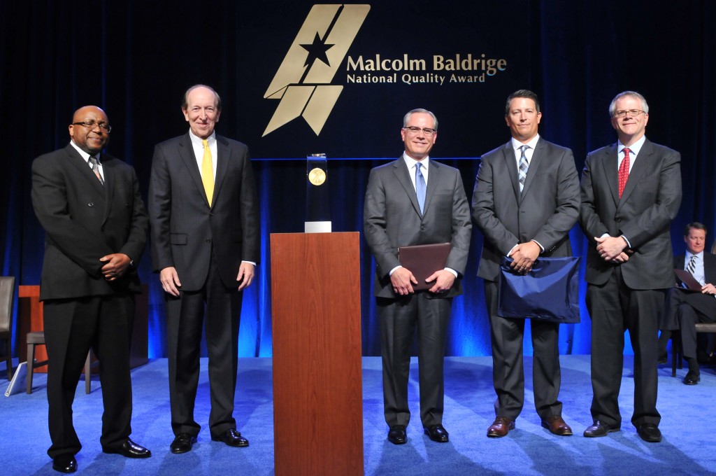 Picture of Elevations Credit Union receiving the Malcolm Baldrige National Quality Award.