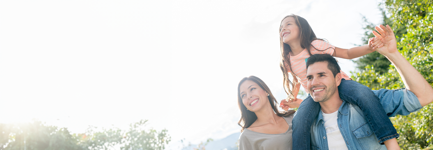 Mom laying on couch reading to daughter ‑ Resource Center