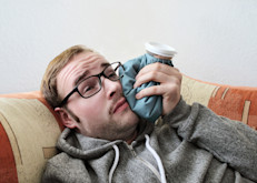 There are no home remedies that can cure herpes, but there are some methods that can help relieve the discomfort of a herpes outbreak. For example, applying ice to blisters or sores reduces swelling and relieves pain, as does applying an antiviral skin cream. Washing the area with an antiseptic soap can prevent the virus from spreading. Avoid hot beverages and spicy or citrus foods. 