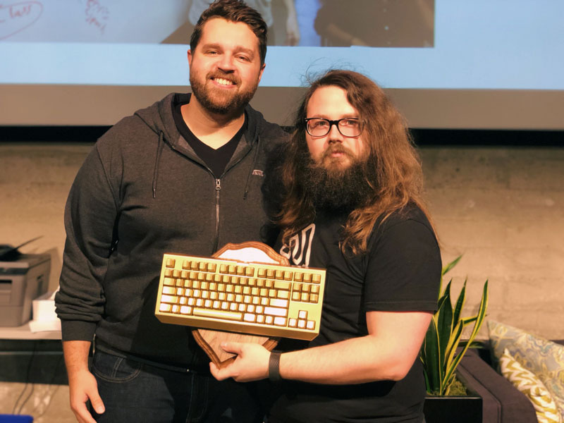 Team Strut poses with their trophy