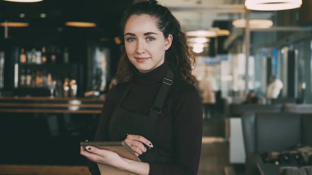 Small business owner implementing AI tools