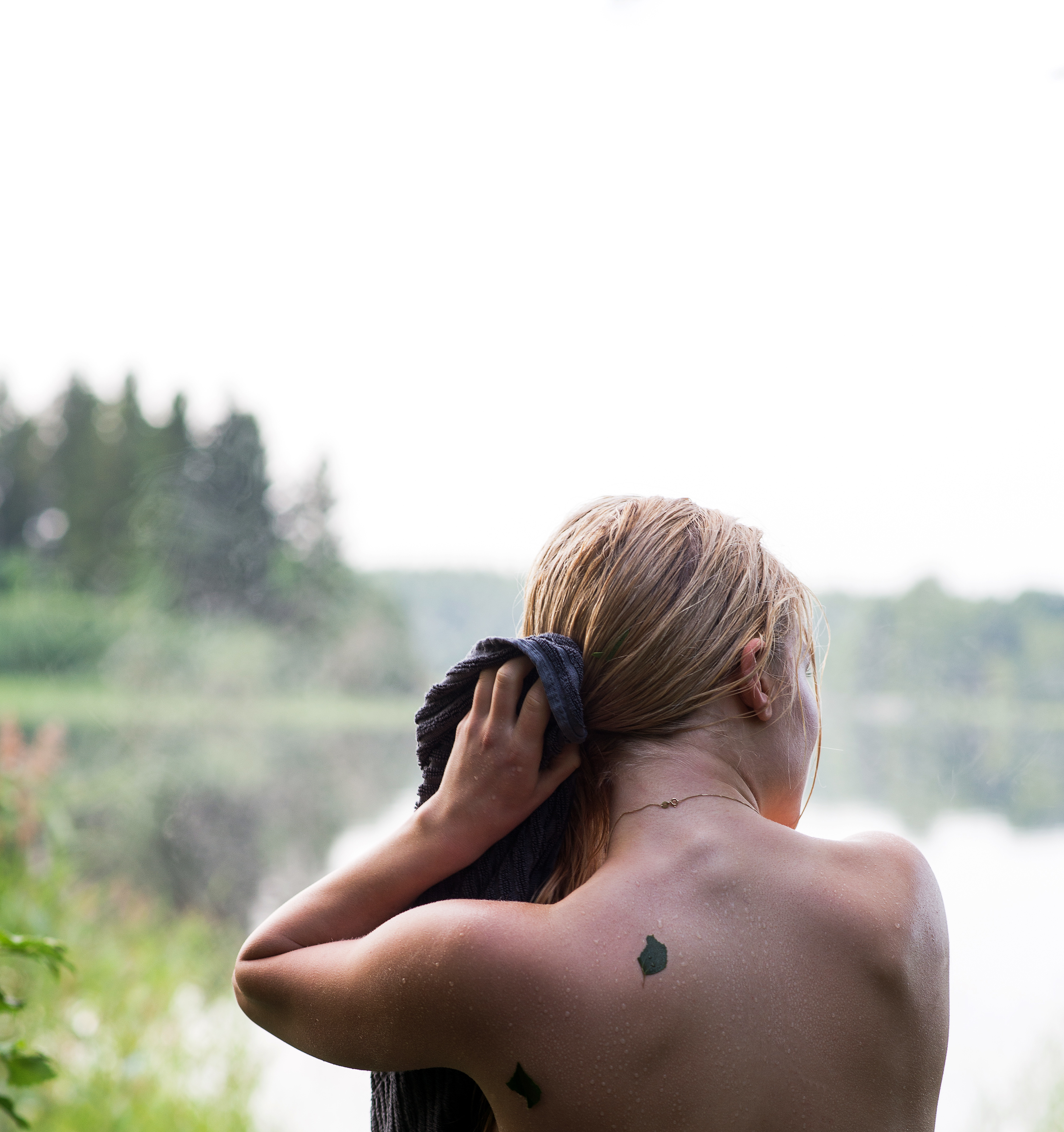 Woman drying her hair