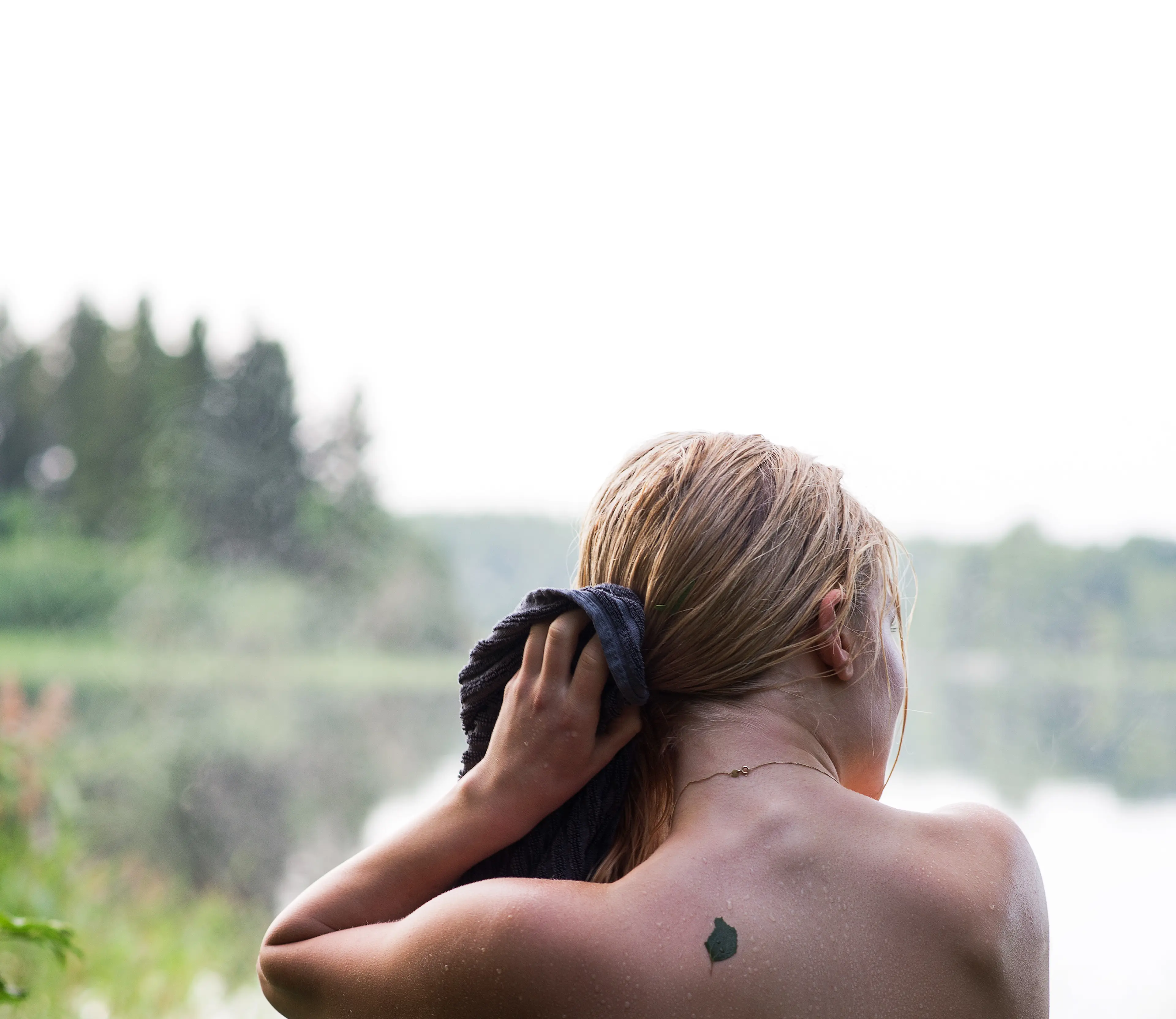 Woman drying her hair