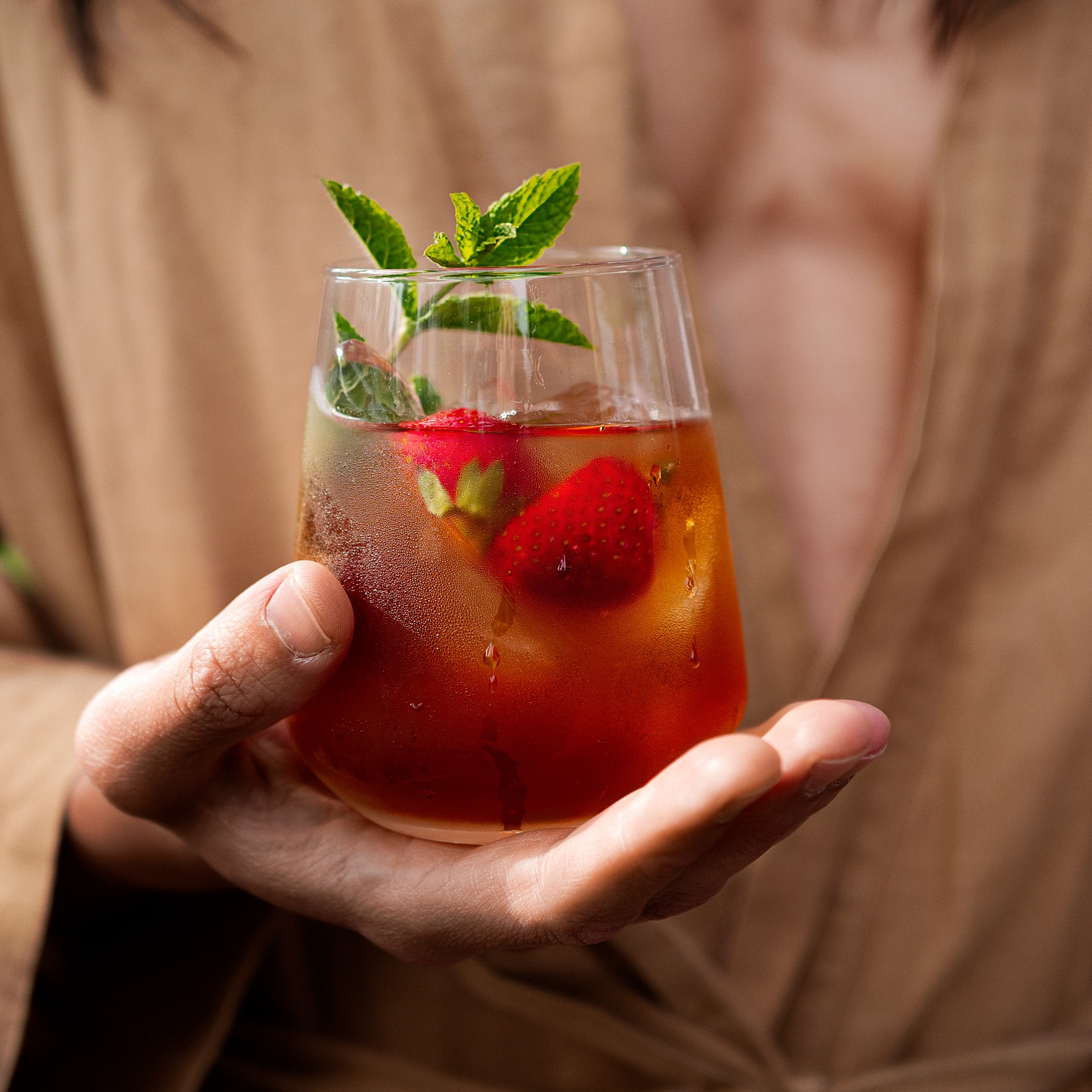 Detail of drink in man's hand