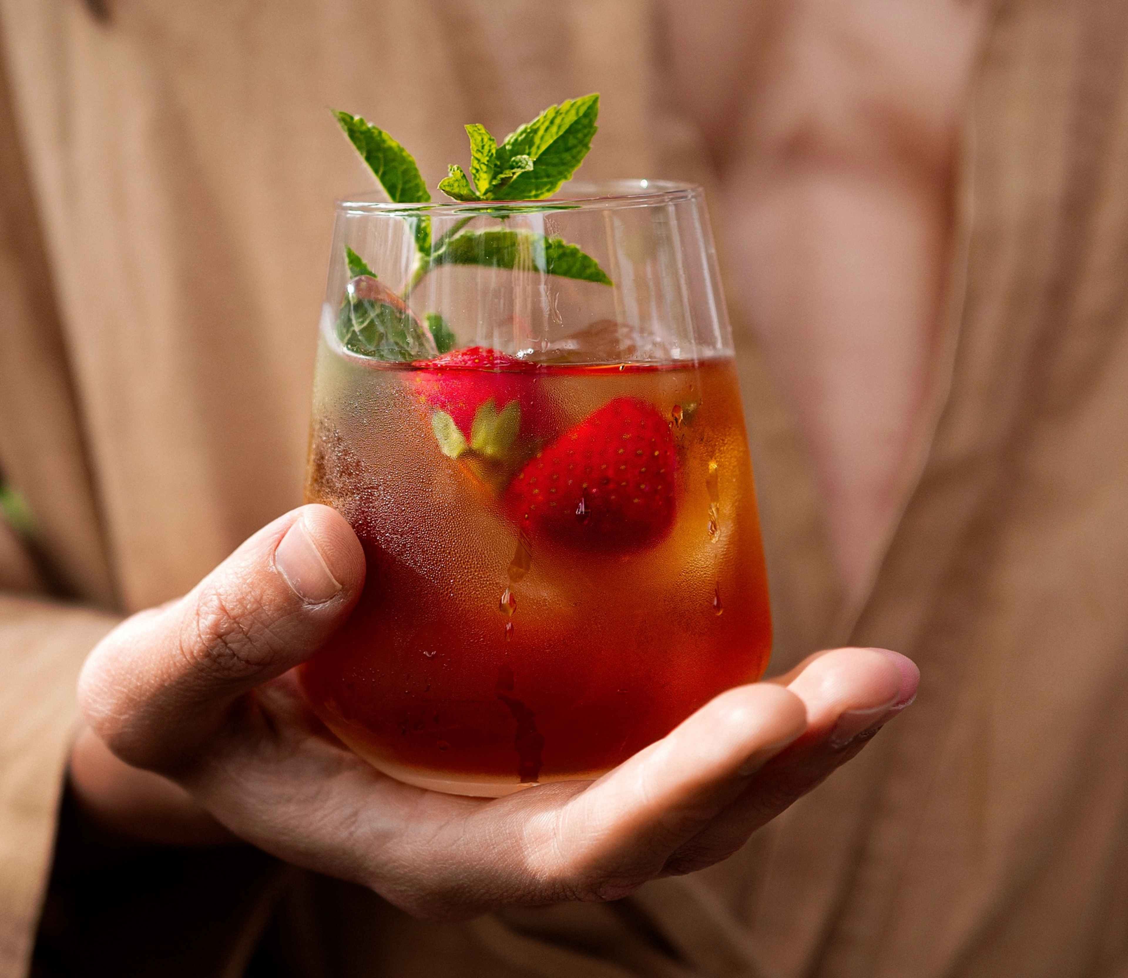 Detail of drink in man's hand