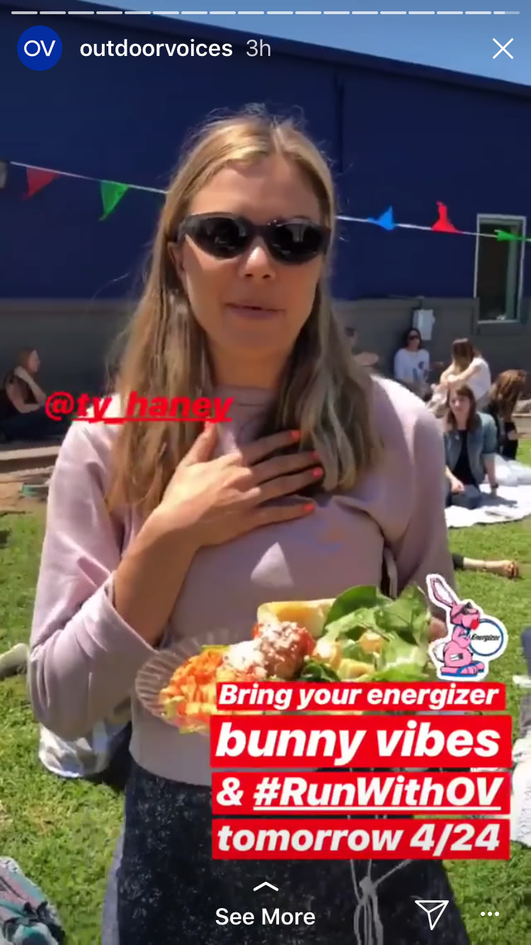 An image from Instagram stories featuring a woman holding plate of food outdoors and the text "Bring your energizer bunny Vibes & #RunWithOV tomorrow 4/24"