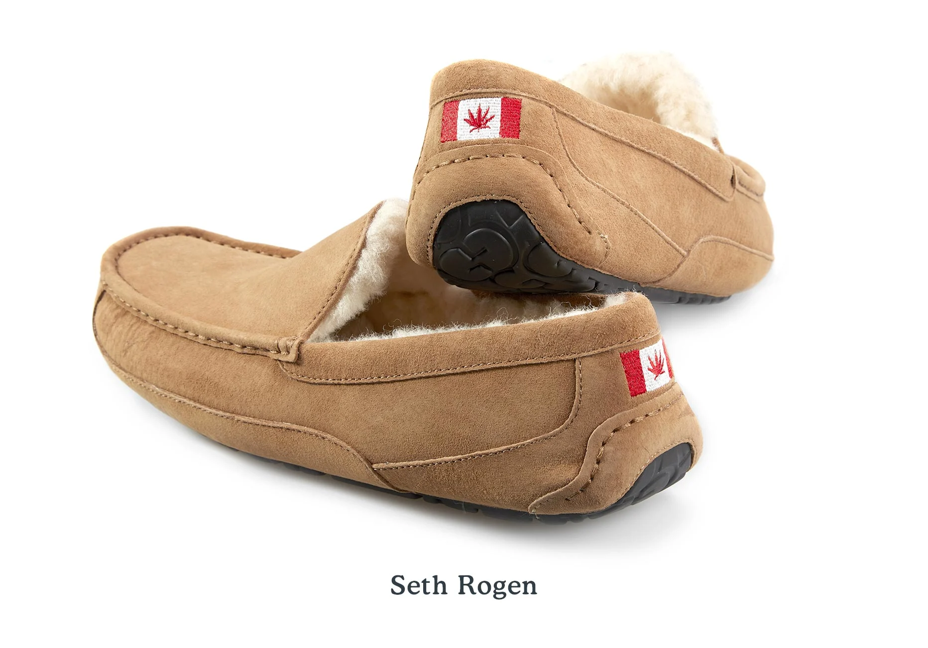 A pair of UGG Slippers for Seth Rogen with embroidery of a Canadian flag on the heel