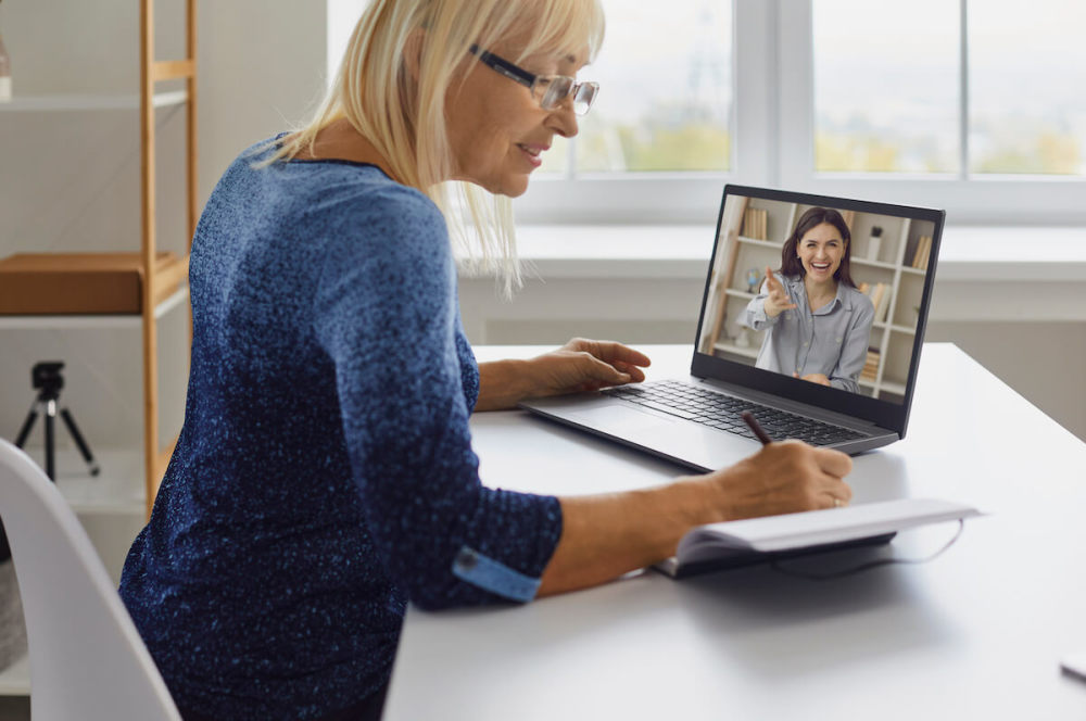 Online nutrition coach at a video call with a client
