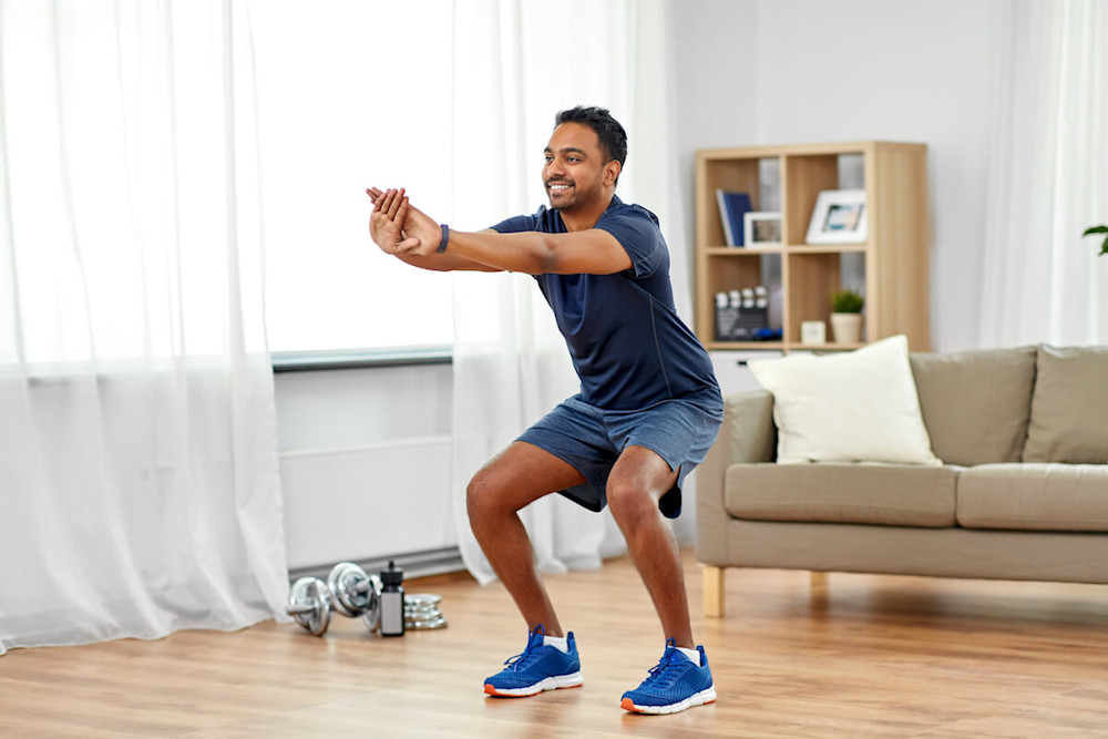 Functional fitness: man doing squats