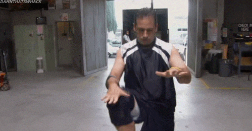 Bodyweight workout plan: Michael from The Office doing high knees GIF