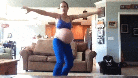 Pregnant woman working out GIF